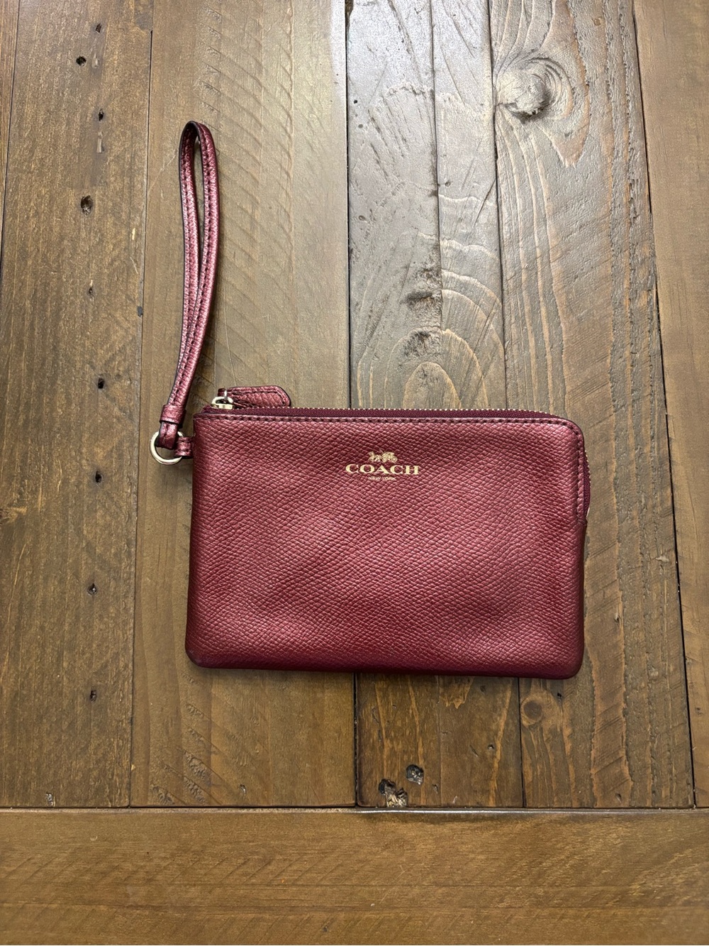 Coach Pebbled Leather Wristlet in Metallic Burgundy